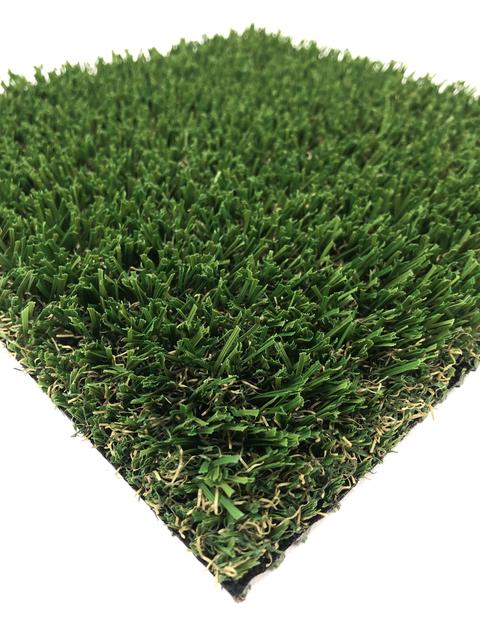 Synthetic turf installation in Delray Beach, FL showing detail of fake grass