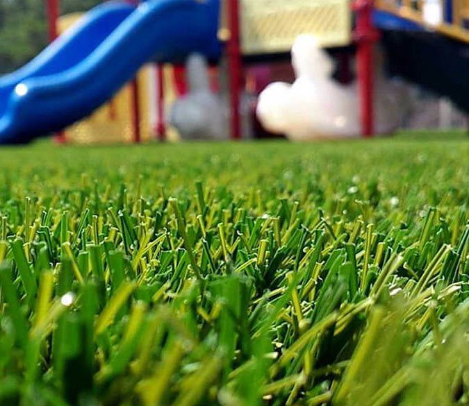 Close up of synthetic turf at a playground in Boca Raton, Florida
