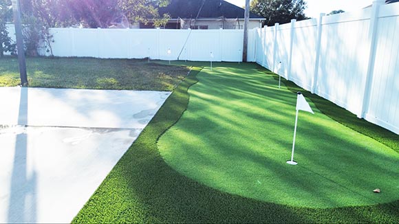 Backyard with Putting Green Artificial Grass in Lantana, FL